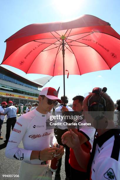 Charles Leclerc of Monaco and Sauber F1 prepares to drive on the grid before the Formula One Grand Prix of Great Britain at Silverstone on July 8,...