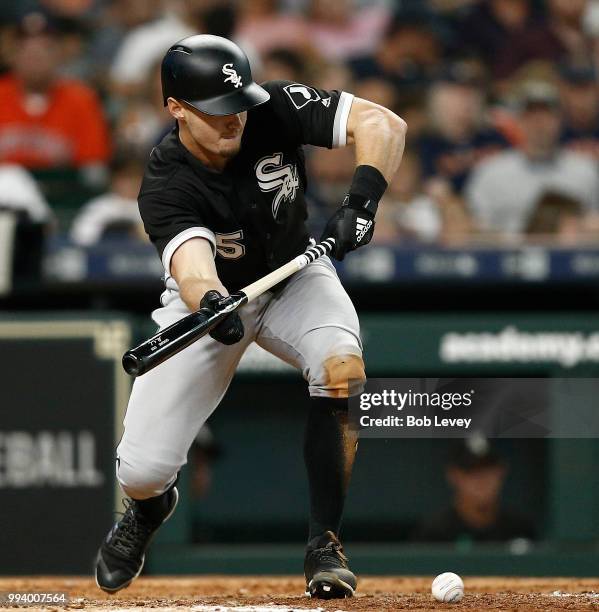 Adam Engel of the Chicago White Sox lays down a sacrifice bunt in the seventh inning against the Houston Astros at Minute Maid Park on July 8, 2018...