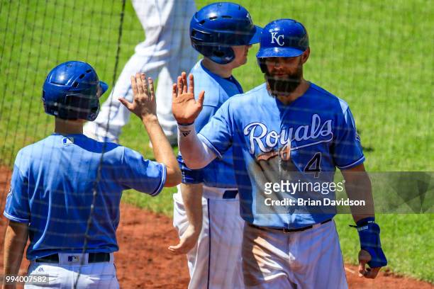 Alex Gordon of the Kansas City Royals celebrates scoring a run against the Boston Red Sox during the fourth inning at Kauffman Stadium on July 8,...