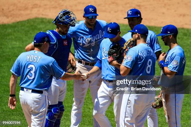 Heath Fillmyer of the Kansas City Royals is taken out of the game by manager Ned Yost during the fifth inning against the Boston Red Sox at Kauffman...