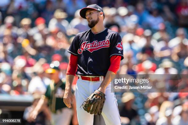 Relief pitcher Dan Otero of the Cleveland Indians reacts after giving up a solo home run to Jed Lowrie of the Oakland Athletics during the seventh...