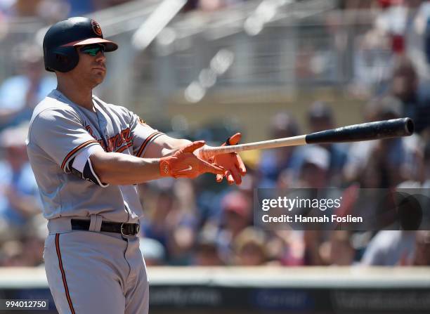 Chris Davis of the Baltimore Orioles reacts to striking out against the Minnesota Twins during the first inning of the game on July 8, 2018 at Target...