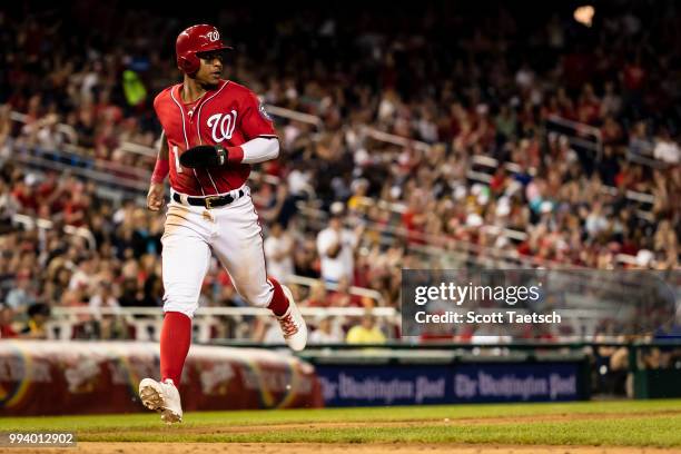 Wilmer Difo of the Washington Nationals scores against the Miami Marlins during the seventh inning at Nationals Park on July 07, 2018 in Washington,...