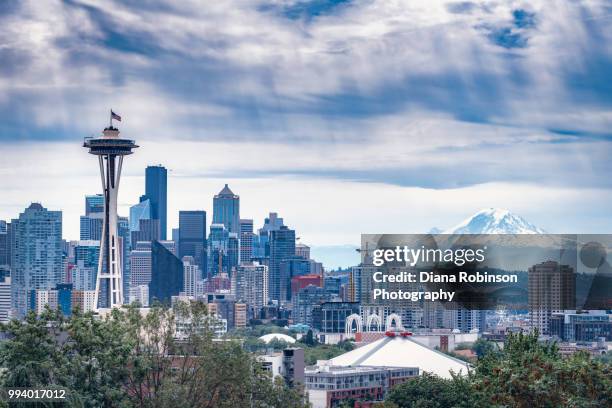 seattle skyline with american flag on space needle on the fourth of july from kerry park, washington - seattle landscape stock pictures, royalty-free photos & images