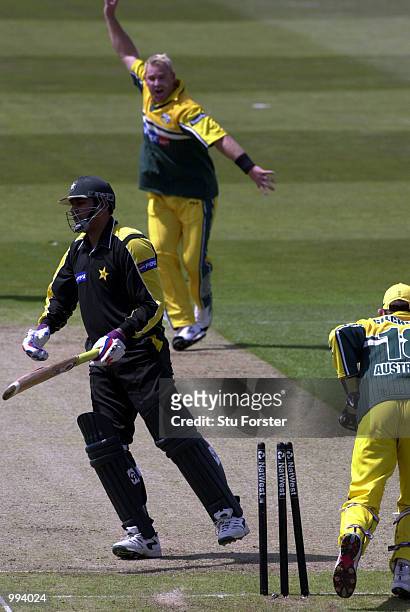 Shane Warne celebrates taking the wicket of Pakistan batsman Inzaman-Ul-Haq, stumped by Australian wicketkeeper Adam Gilchrist, during the Natwest...