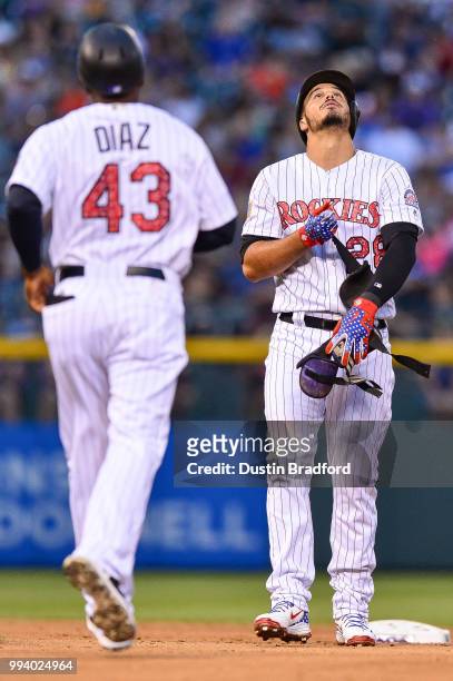Nolan Arenado of the Colorado Rockies celebrates after hitting a double against the San Francisco Giants at Coors Field on July 2, 2018 in Denver,...