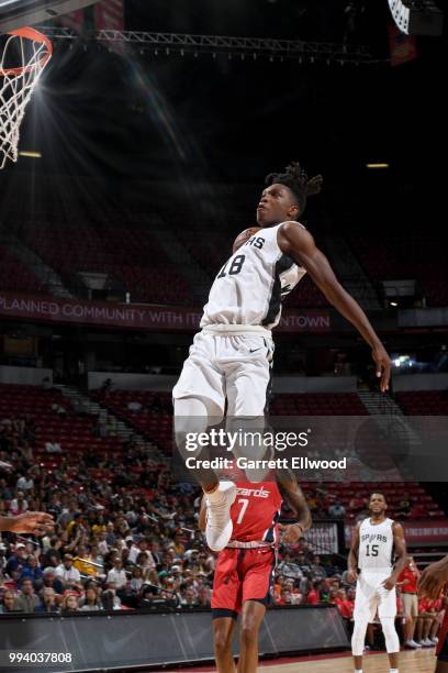 Lonnie Walker IV of the San Antonio Spurs goes up for a dunk against the Washington Wizards during the 2018 Las Vegas Summer League on July 8, 2018...