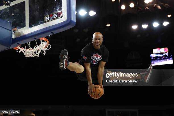 Performer dunks the ball during an intermission in week three of the BIG3 three on three basketball league game at ORACLE Arena on July 6, 2018 in...