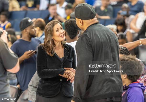 Oakland mayor Libby Shaff greets LL Cool J, rapper and entertainer between game 1 and game 2 in week three of the BIG3 3-on-3 basketball league on...