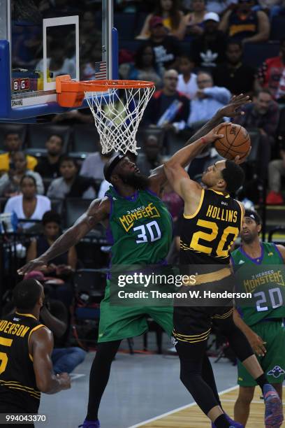 Ryan Hollins of Killer 3s goes up for a shot against Reggie Evans of 3 Headed Monsters during week three of the BIG3 three on three basketball league...