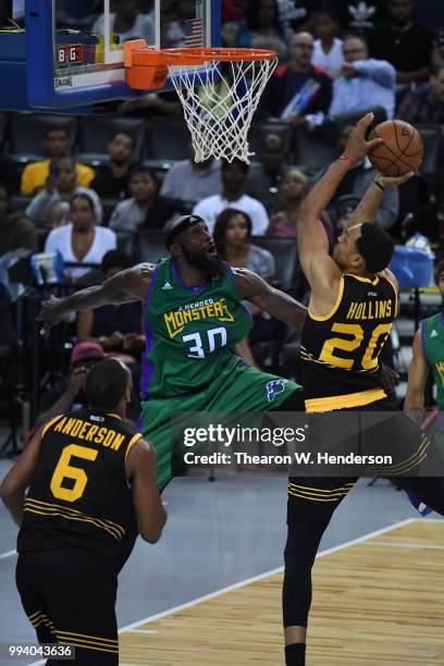 Ryan Hollins of Killer 3s goes up for a shot against Reggie Evans of 3 Headed Monsters during week three of the BIG3 three on three basketball league...