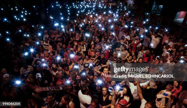 Supporters of former Brazilian President Luiz Inacio Lula da Silva -in jail since April for corruption- demonstrate demanding his release in Sao...