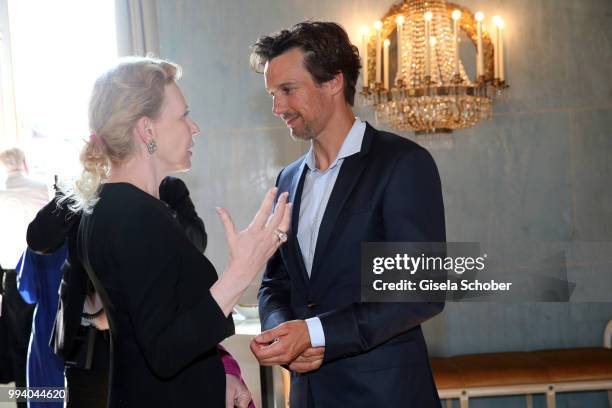 Sunnyi Melles and Florian David Fitz during the 'Oper fuer alle - Parsifal' as part of the Munich Opera Festival at Nationaltheater on July 8, 2018...