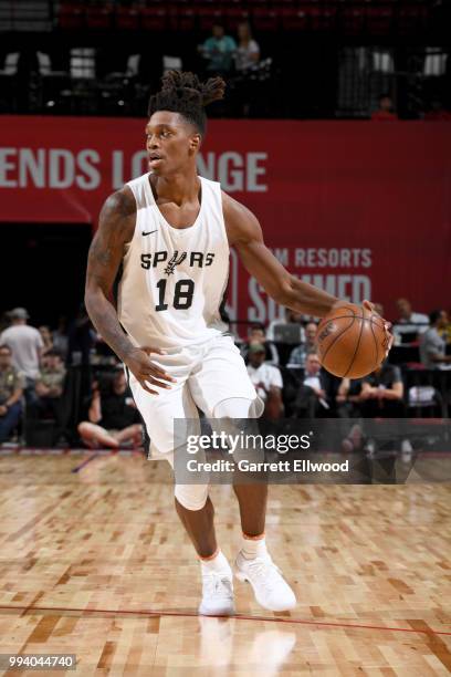 Lonnie Walker IV of the San Antonio Spurs handles the ball against the Washington Wizards during the 2018 Las Vegas Summer League on July 8, 2018 at...