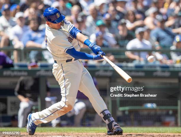 Ryon Healy of the Seattle Mariners hits a three-run home run off of starting pitcher Antonio Senzatela of the Colorado Rockies that also scored Kyle...