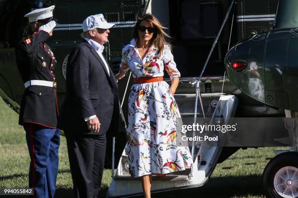 President Donald Trump and first lady Melania Trump step off Marine One on the South Lawn upon arrival at the White House on July 8, 2018 in...