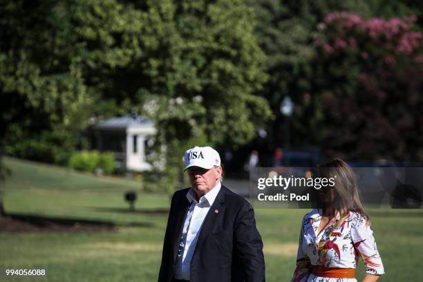 President Donald Trump and first lady Melania Trump cross the South Lawn upon arrival at the White House on July 8, 2018 in Washington, DC. The First...