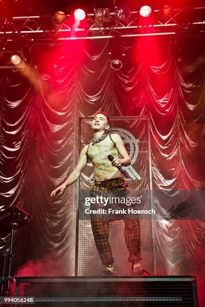 Singer Olly Alexander of the British band Years & Years performs live on stage during a concert at the Kesselhaus on July 8, 2018 in Berlin, Germany.