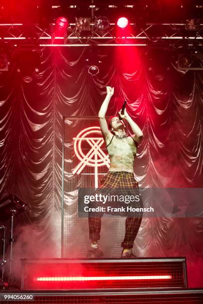 Singer Olly Alexander of the British band Years & Years performs live on stage during a concert at the Kesselhaus on July 8, 2018 in Berlin, Germany.