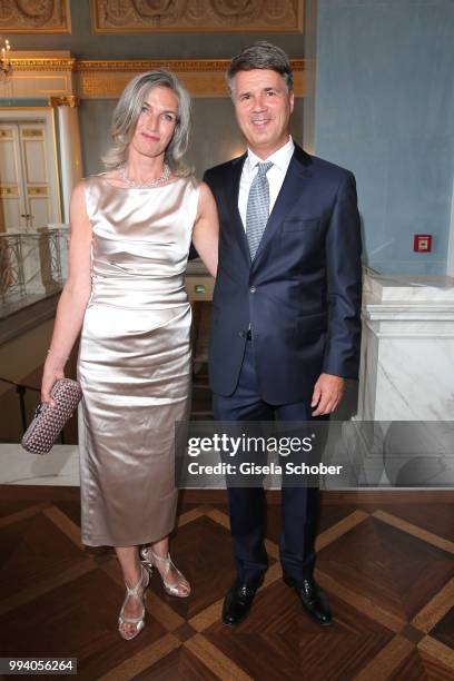 Harald Krueger, CEO BMW and his wife Martina Krueger during the 'Oper fuer alle - Parsifal' as part of the Munich Opera Festival at Nationaltheater...