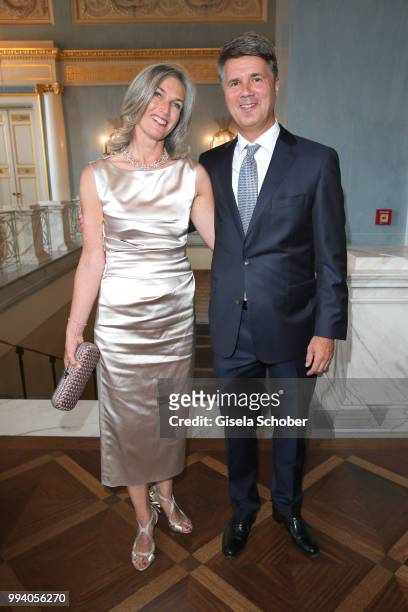 Harald Krueger, CEO BMW and his wife Martina Krueger during the 'Oper fuer alle - Parsifal' as part of the Munich Opera Festival at Nationaltheater...