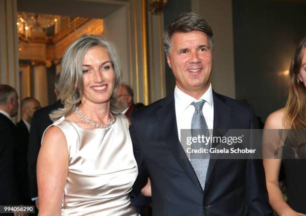 Harald Krueger, CEO BMW and his wife Martina Krueger during the 'Oper fuer alle - Parsifal' as part of the Munich Opera Festival at Nationaltheater...