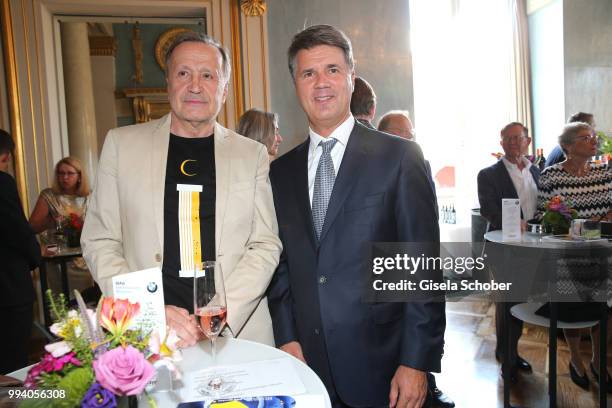 Intendant Nikolaus Bachler and Harald Krueger, CEO BMW during the 'Oper fuer alle - Parsifal' as part of the Munich Opera Festival at Nationaltheater...