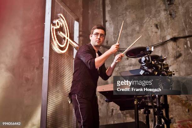Emre Tuerkmen of the British band Years & Years performs live on stage during a concert at the Kesselhaus on July 8, 2018 in Berlin, Germany.
