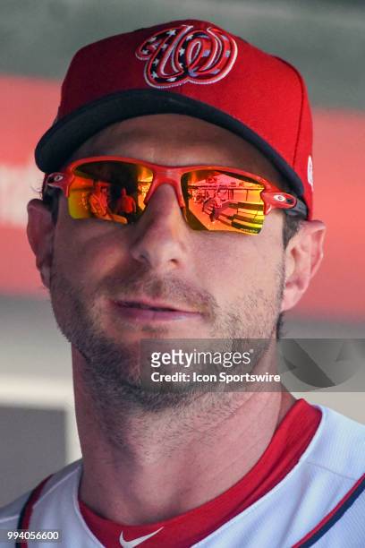 Washington Nationals starting pitcher Max Scherzer stands in the dugout during the game between the Miami Marlins and the Washington Nationals on...