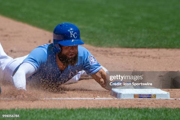 Kansas City Royals left fielder Alex Gordon dives into 3rd base during the MLB game against the Boston Red Sox on July 08, 2018 at Kauffman Stadium...