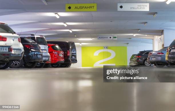 Cars in a multi-storey car park in Muenster, Germany, 8 September 2017. The width of parking spaces is to be increased in many car parks to keep up...