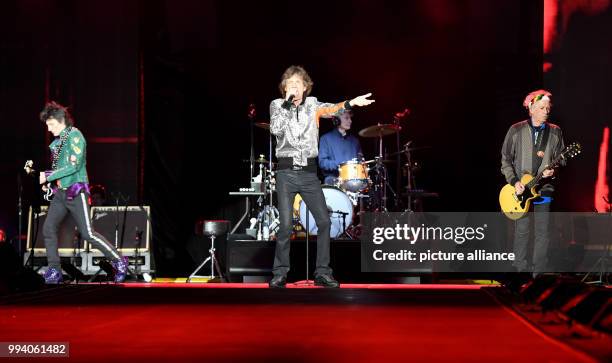 The Rolling Stones with Mick Jagger , Keith Richards , Charlie Watts and Ron Wood perform on stage during the start of the Rolling Stones Europe tour...