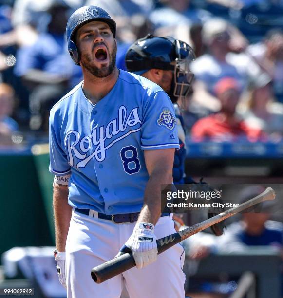Kansas City Royals' Mike Moustakas walks back to the dugout after striking out in the seventh inning during Sunday's baseball game against the Boston...