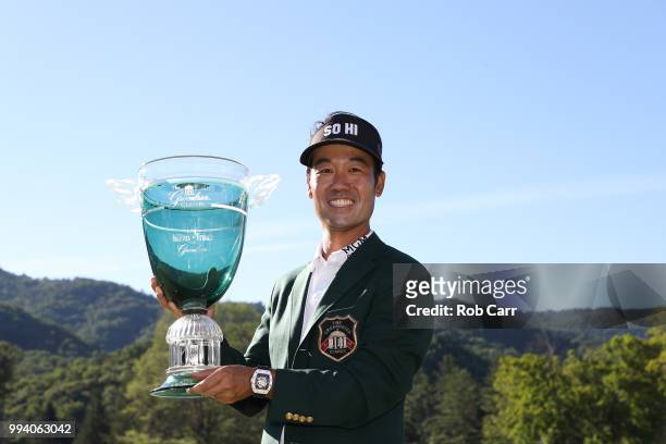 Kevin Na holds the trophy after winning the tournament at A Military Tribute At The Greenbrier held at the Old White TPC course on July 8, 2018 in...