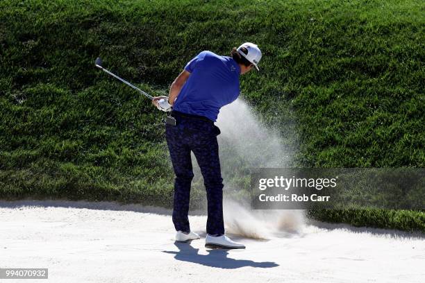 Kelly Kraft hits from the bunker to the 12th green during the final round of A Military Tribute At The Greenbrier held at the Old White TPC course on...