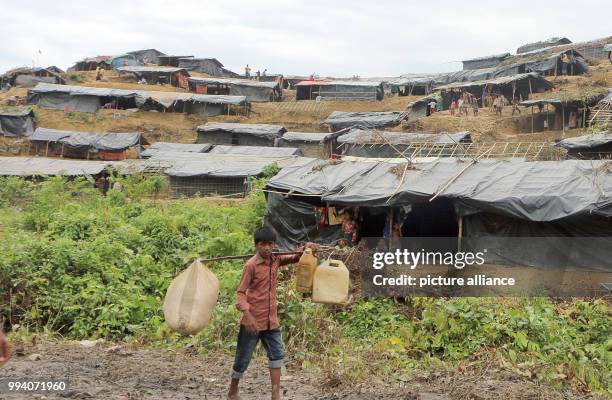 The Rohingya refugees erected these tents as a temporary shelter after they arrived in Kutupalong, Bangladesh, 10 September 2017. Nearly 300,000...