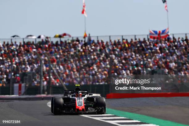 Kevin Magnussen of Denmark driving the Haas F1 Team VF-18 Ferrari on track during the Formula One Grand Prix of Great Britain at Silverstone on July...