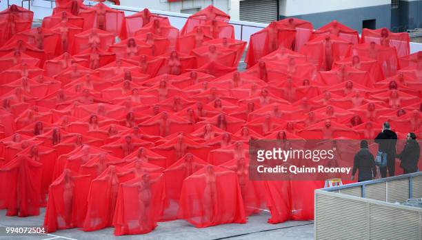 Participants pose for Spencer Tunick as part of Spencer Tunick's nude art installation Return of the Nude on July 9, 2018 in Melbourne, Australia....