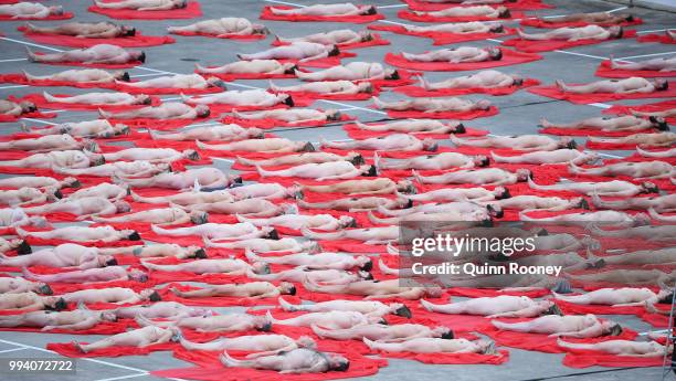 Participants pose for Spencer Tunick as part of Spencer Tunick's nude art installation Return of the Nude on July 9, 2018 in Melbourne, Australia....