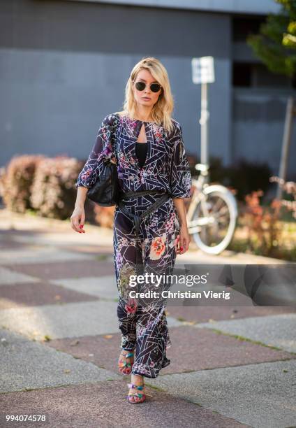 Gitta Banko wearing Dawid Tomaszewski dress outside Dawid Tomaszewski duirng the Berlin Fashion Week July 2018 on July 5, 2018 in Berlin, Germany.