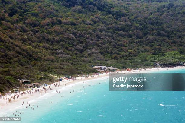 forno beach in arraial do cabo, rio de janeiro - forno stock pictures, royalty-free photos & images