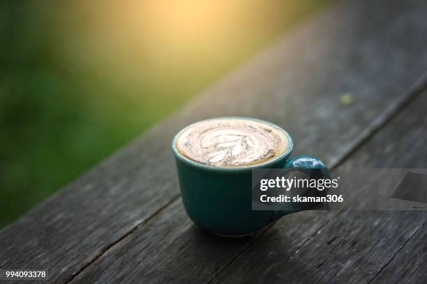 asian female feel relax and drink coffee - coffee drink stock pictures, royalty-free photos & images