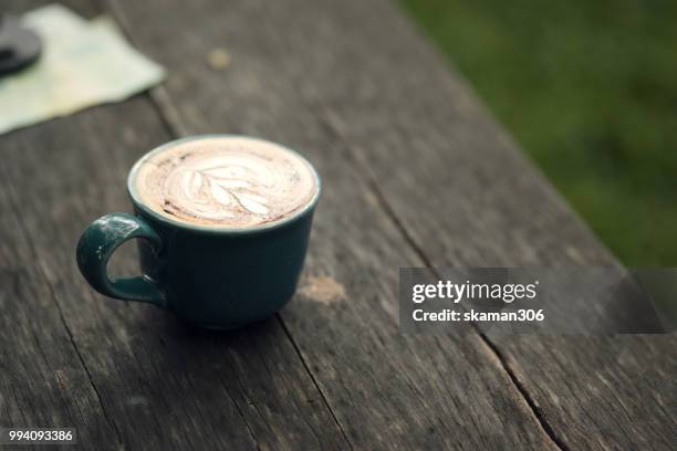 asian female feel relax and drink coffee - coffee drink stock pictures, royalty-free photos & images