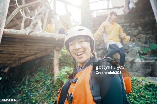 Young man prepared and ready to go white water river rafting