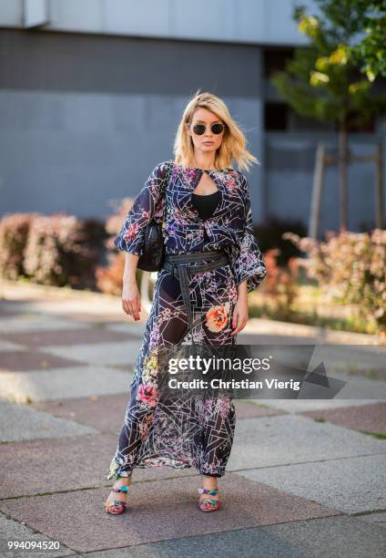 Gitta Banko wearing Dawid Tomaszewski dress outside Dawid Tomaszewski duirng the Berlin Fashion Week July 2018 on July 5, 2018 in Berlin, Germany.