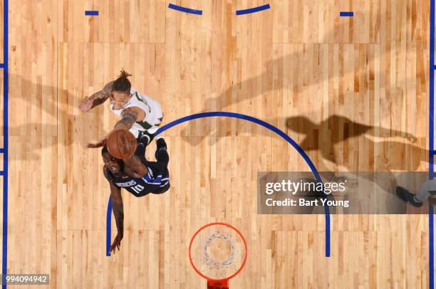 Dorian Finney-Smith of the Dallas Mavericks drives to the basket during the game against the Milwaukee Bucks on July 8, 2018 at the Cox Pavilion in...