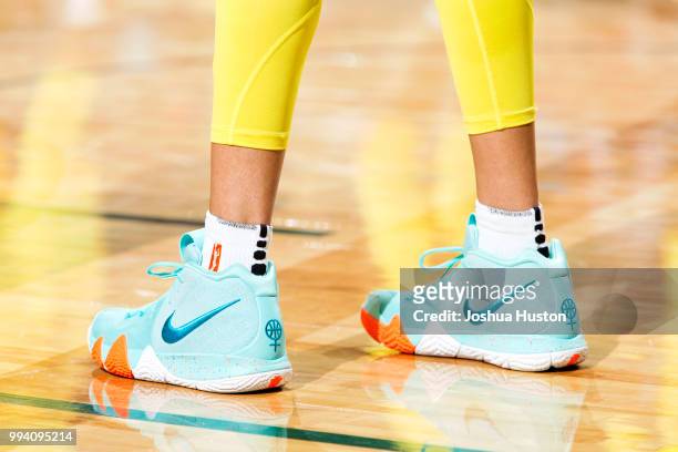Sneakers of Sue Bird of the Seattle Storm during the game against the Washington Mystics on July 8, 2018 at Key Arena in Seattle, Washington. NOTE TO...