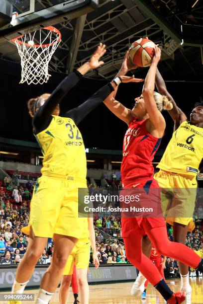 Elena Delle Donne of the Washington Mystics goes to the basket against the Seattle Storm on July 8, 2018 at Key Arena in Seattle, Washington. NOTE TO...