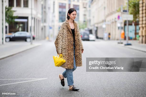 Maria Barteczko wearing leopard print coat Valentino, black Villalo cashmere top, used Monki boyfriend jeans, black fur slipper Gucci, yellow...