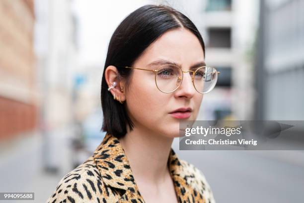 Maria Barteczko wearing leopard print coat Valentino, black Villalo cashmere top, used Monki boyfriend jeans, black fur slipper Gucci, yellow...